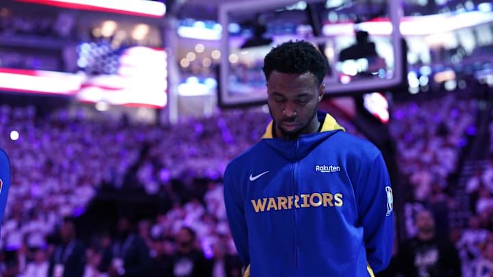 Apr 15, 2023; Sacramento, California, USA; Golden State Warriors forward Andrew Wiggins (22) stands on the court before their game against the Sacramento Kings during the national anthem during game one of the 2023 NBA playoffs at the Golden 1 Center. Mandatory Credit: Cary Edmondson-Imagn Images