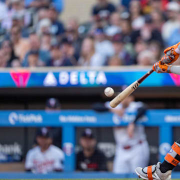 May 10, 2025; Minneapolis, Minnesota, USA; San Francisco Giants outfielder Heliot Ramos (17) hits a home run off the pitch from Minnesota Twins starting pitcher Joe Ryan (41) in the second inning at Target Field.