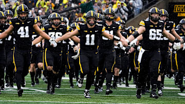 Take a shot on Iowa to upset USC in college football Week 12 action.