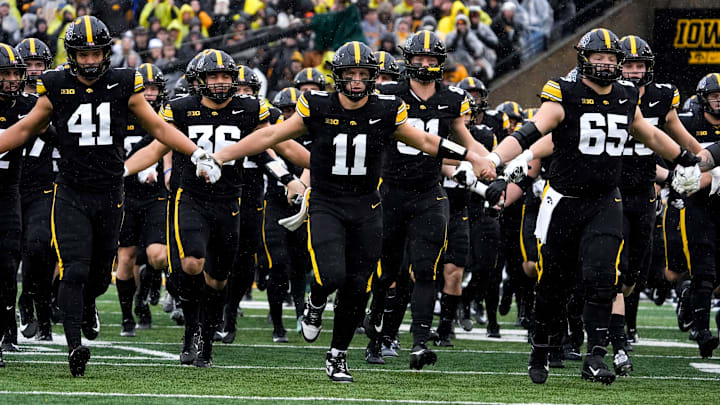 Take a shot on Iowa to upset USC in college football Week 12 action.