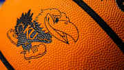 Nov 10, 2022; Lawrence, Kansas, USA; A detailed view of the Kansas Jayhawks logo on a basketball prior to a game against the North Dakota State Bison at Allen Fieldhouse. Mandatory Credit: Jay Biggerstaff-Imagn Images