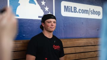 Top baseball prospect Jackson Holliday talks with the media prior to the Norfolk Tides' game with the WooSox on Friday at Polar Park.