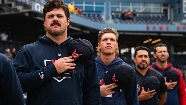 Pitchers Payton Tolle (left) and Connelly Early (second from left) stand for the national anthem ahead of Triple-A Worcester's game at Polar Park on Aug. 21, 2025.