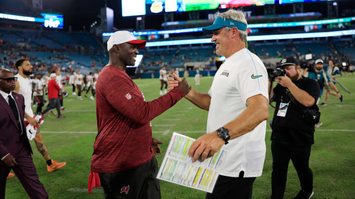 Tampa Bay Buccaneers head coach Todd Bowles, left, and Jacksonville Jaguars head coach Doug Pederson shake hands after a preseason NFL football game Saturday, Aug. 17, 2024 at EverBank Stadium in Jacksonville, Fla. The Jacksonville Jaguars defeated the Tampa Bay Buccaneers 20-7. [Corey Perrine/Florida Times-Union]