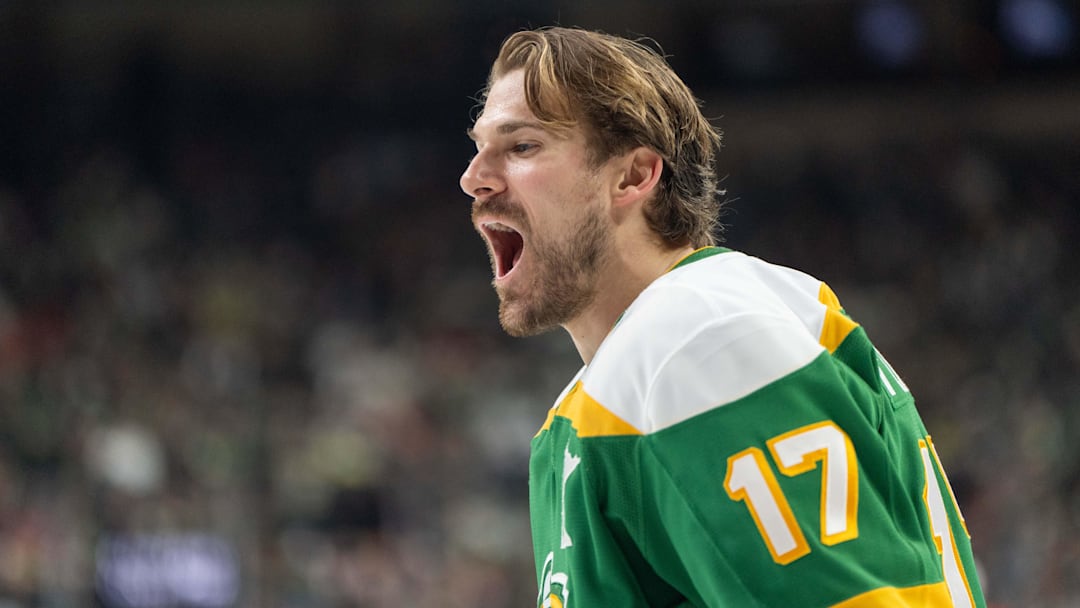 Jan 25, 2025; Saint Paul, Minnesota, USA; Minnesota Wild left wing Marcus Foligno (17) cheers on a teammate during warm ups for a game against the Calgary Flames in the first period at Xcel Energy Center. Mandatory Credit: Matt Blewett-Imagn Images