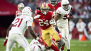 Dec 17, 2023; Glendale, Arizona, USA; San Francisco 49ers running back Jordan Mason (24) against the Arizona Cardinals at State Farm Stadium. Mandatory Credit: Mark J. Rebilas-USA TODAY Sports