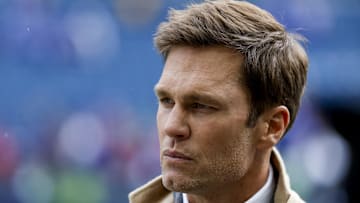 Oct 27, 2024; Seattle, Washington, USA; FOX commentator Tom Brady stands on the sideline before a game between the Seattle Seahawks and Buffalo Bills at Lumen Field. Mandatory Credit: Joe Nicholson-Imagn Images