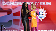 Apr 14, 2025; New York, New York, USA; Aneesah Morrow poses with WNBA commissioner Cathy Engelbert after being selected with the number seven overall pick to the Connecticut Sun in the 2025 WNBA Draft at The Shed at Hudson Yards. Mandatory Credit: Vincent Carchietta-Imagn Images
