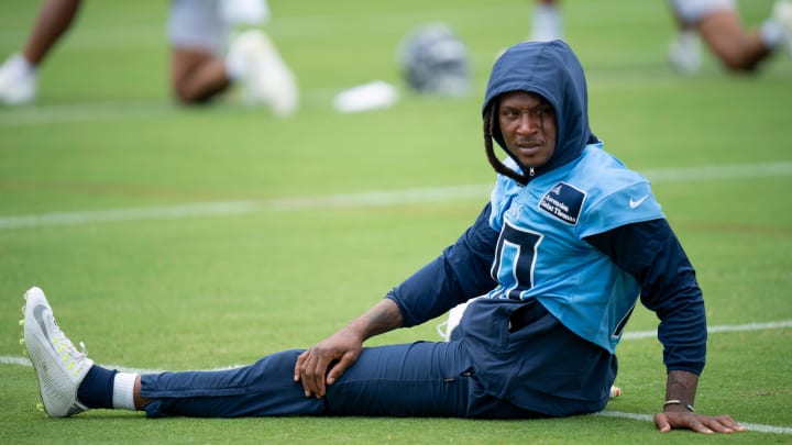 Wide receiver DeAndre Hopkins (10) stretches during the Tennessee Titans mandatory mini-camp at Ascension Saint Thomas Sports Park in Nashville, Tenn., Wednesday, June 5, 2024.