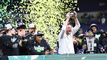Dec 7, 2024; Indianapolis, IN, USA; Oregon Ducks head coach Dan Lanning and the Oregon Ducks celebrate defeating the Penn State Nittany Lions to win the Big Ten Championship in the 2024 Big Ten Championship game at Lucas Oil Stadium.