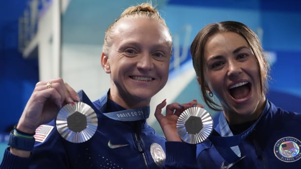 Sarah Bacon and Kassidy Cook (USA) celebrate after placing second and winning the silver medal