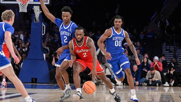 Dec 21, 2024; New York, New York, USA; Ohio State Buckeyes guard Bruce Thornton (2) brings the ball up court while being defended by Kentucky Wildcats guard Jaxson Robinson (2) during the second half at Madison Square Garden. Mandatory Credit: John Jones-Imagn Images