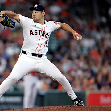 Sep 7, 2024; Houston, Texas, USA; Houston Astros starting pitcher Yusei Kikuchi (16) delivers a pitch against the Arizona Diamondbacks during the first inning at Minute Maid Park.