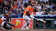 Baltimore Orioles right fielder Dylan Beavers (12) hits a double against the Houston Astros during the ninth inning at Daikin Park. 