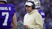 Nov 2, 2024; Seattle, Washington, USA; Washington Huskies head coach Jedd Fisch stands on the sideline during the first quarter against the USC Trojans at Alaska Airlines Field at Husky Stadium. Mandatory Credit: Joe Nicholson-Imagn Images