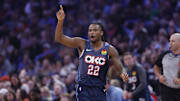 Dec 5, 2025; Oklahoma City, Oklahoma, USA; Oklahoma City Thunder guard Cason Wallace (22) gestures after scoring against the Dallas Mavericks during the second quarter at Paycom Center.