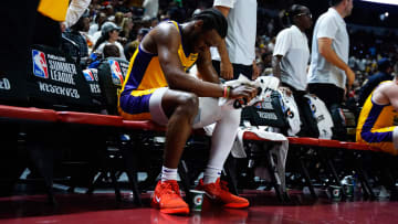 Jul 12, 2024; Las Vegas, NV, USA; Los Angeles Lakers guard Bronny James (9) sits on the bench during the second half against the Houston Rockets at Thomas & Mack Center. Mandatory Credit: Lucas Peltier-USA TODAY Sports