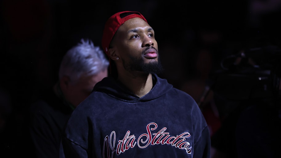 Portland Trail Blazers guard Damian Lillard welcomes his teammates to the starting line up.