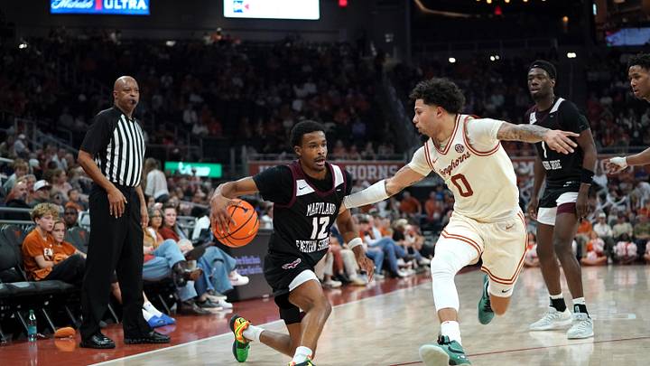 Dec 22, 2025; Austin, Texas, USA;Maryland Eastern Shore Hawks guard Justin Monden (12) dribbles against Texas Longhorns guard Jordan Pope (0) during the second half at Moody Center. Mandatory Credit: Dustin Safranek-Imagn Images