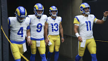 Aug 24, 2024; Houston, Texas, USA; Los Angeles Rams quarterback Dresser Winn (4) and quarterback Matthew Stafford (9) and quarterback Stetson Bennett (13) and quarterback Jimmy Garoppolo (11) walk onto the field before the game against the Houston Texans at NRG Stadium. Mandatory Credit: Troy Taormina-USA TODAY Sports