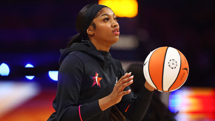 Team WNBA forward Angel Reese (5) warms up before the game 