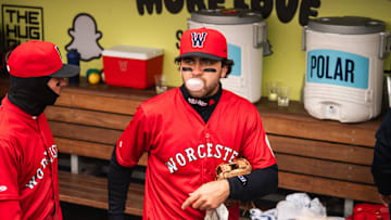 Marcelo Mayer blows a bubble with his gum in the WooSox dugout during a game on April 13, 2025 at Polar Park.