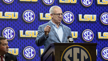 Oct 15, 2025; Birmingham, AL, USA; SEC commissioner Greg Sankey introduces LSU Tigers head coach Matt McMahon during SEC Media Days at Grand Bohemian Hotel. Mandatory Credit: Vasha Hunt-Imagn Images