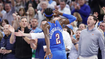 Apr 9, 2024; Oklahoma City, Oklahoma, USA; Oklahoma City Thunder guard Shai Gilgeous-Alexander (2) listens to the fans cheer after he scores against the Sacramento Kings during the second half at Paycom Center. Mandatory Credit: Alonzo Adams-USA TODAY Sports