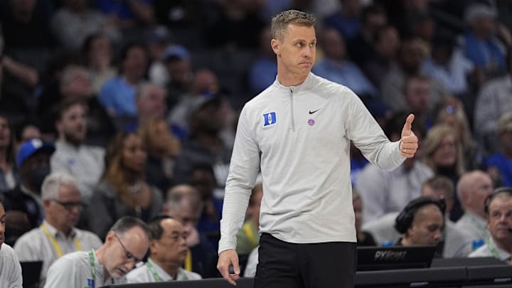 Mar 13, 2025; Charlotte, NC, USA; Duke Blue Devils head coach Jon Scheyer gives a thumbs up to his offense against the Georgia Tech Yellow Jackets.