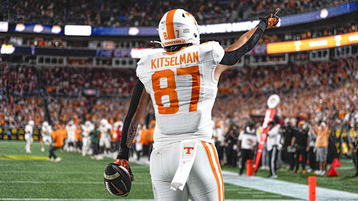 Sep 7, 2024; Charlotte, North Carolina, USA;  Tennessee Volunteers tight end Miles Kitselman (87) celebrates after scoring a touchdown against the North Carolina State Wolfpack during the second half at the Dukes Mayo Classic at Bank of America Stadium. Mandatory Credit: Jim Dedmon-Imagn Images