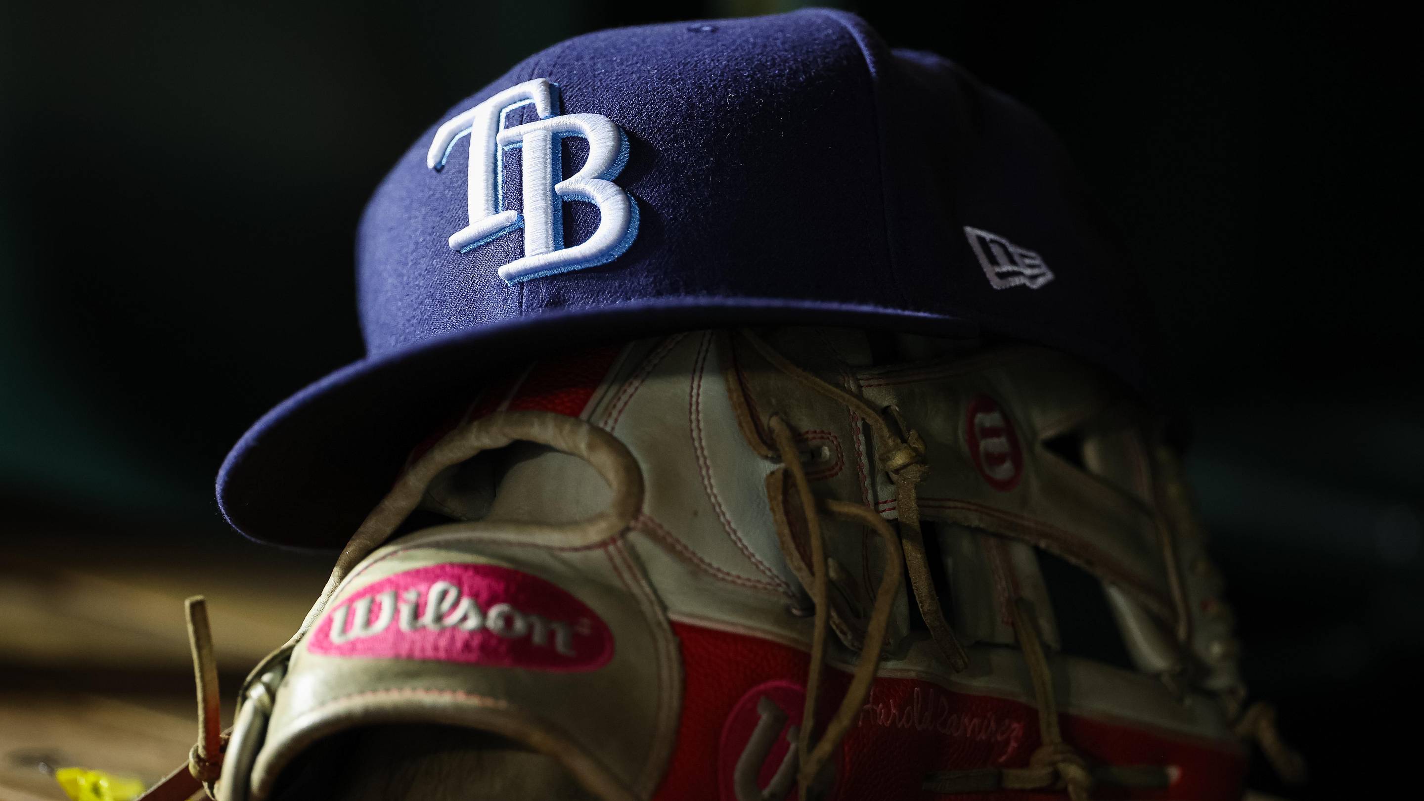 Apr 3, 2023; Washington, District of Columbia, USA; A general view of a Tampa Bay Rays hat and glove during the seventh inning of the game against the Washington Nationals at Nationals Park. Mandatory Credit: Scott Taetsch-Imagn Images