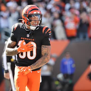Oct 26, 2025; Cincinnati, Ohio, USA; Cincinnati Bengals running back Chase Brown (30) celebrates scoring a touchdown during the second quarter against the New York Jets at Paycor Stadium. Mandatory Credit: Joseph Maiorana-Imagn Images