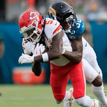 Jacksonville Jaguars cornerback Montaric Brown (30) tackles Kansas City Chiefs wide receiver Hollywood Brown (5) during the first quarter of a preseason NFL football game Saturday, Aug. 10, 2024 at EverBank Stadium in Jacksonville, Fla. [Corey Perrine/Florida Times-Union]