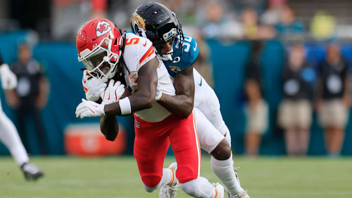 Jacksonville Jaguars cornerback Montaric Brown (30) tackles Kansas City Chiefs wide receiver Hollywood Brown (5) during the first quarter of a preseason NFL football game Saturday, Aug. 10, 2024 at EverBank Stadium in Jacksonville, Fla. [Corey Perrine/Florida Times-Union]