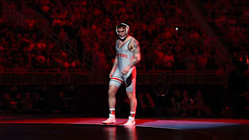 Mar 23, 2024; Kansas City, MO, USA;  At 174 pounds Ohio State Buckeyes Rocco Welsh enters the arena before his match with Penn State Nittany Lions Carter Starocci.  Mandatory Credit: Reese Strickland-Imagn Images