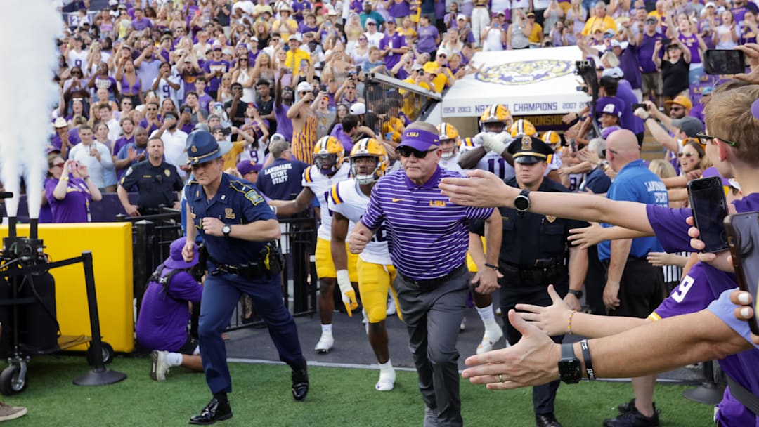 Sep 17, 2022; Baton Rouge, Louisiana, USA;  LSU Tigers head coach Brian Kelly leads the team to the field  against the Mississippi State Bulldogs during the first half at Tiger Stadium. Mandatory Credit: Stephen Lew-USA TODAY Sports