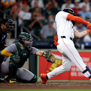 Sep 12, 2024; Houston, Texas, USA; Houston Astros designated hitter Kyle Tucker (30) hits a double to right field against the Oakland Athletics during the third inning at Minute Maid Park