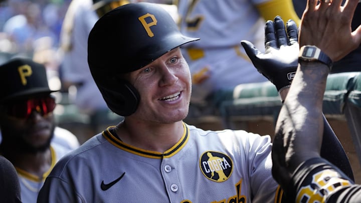 Aug 15, 2025; Chicago, Illinois, USA; Pittsburgh Pirates outfielder Jack Suwinski (65) is greeted after hitting a home run against the Chicago Cubs during the ninth inning at Wrigley Field. Mandatory Credit: David Banks-Imagn Images