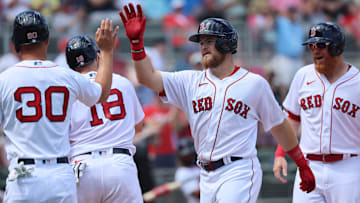 Former Boston Red Sox second baseman Christian Arroyo (39) is congratulated after he hit a grand slam during the third inning against the Philadelphia Phillies at JetBlue Park at Fenway South. 
