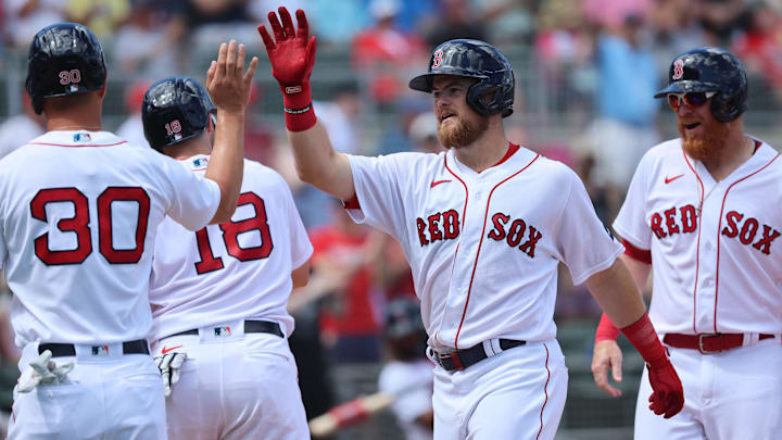 Former Boston Red Sox second baseman Christian Arroyo (39) is congratulated after he hit a grand slam during the third inning against the Philadelphia Phillies at JetBlue Park at Fenway South. 