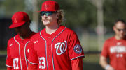 Feb 16, 2023; West Palm Beach, FL, USA; Washington Nationals pitcher Zach Brzykcy (83) walks toward a practice field during a spring training workout at The Ballpark of the Palm Beaches