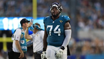 Jacksonville Jaguars offensive tackle Cam Robinson (74) reacts to a catch being confirmed in favor of the Jacksonville Jaguars during the second quarter of a preseason matchup Saturday, Aug. 26, 2023 at EverBank Stadium in Jacksonville, Fla. [Corey Perrine/Florida Times-Union]