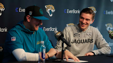 Jacksonville Jaguars general manager James Gladstone, right, smiles at head coach Liam Coen during a press conference at Miller Electric Center Tuesday, April 15, 2025 in Jacksonville, Fla. [Corey Perrine/Florida Times-Union]