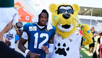 Jacksonville Jaguars wide receiver Travis Hunter (12) is seen with team mascot Jaxson de Ville after an NFL training camp session at the Miller Electric Center, Tuesday, July 29, 2025, in Jacksonville, Fla. [Corey Perrine/Florida Times-Union]