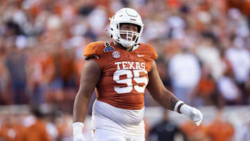 Dec 21, 2024; Austin, Texas, USA; Texas Longhorns defensive lineman Alfred Collins (95) against the Clemson Tigers during the CFP National playoff first round at Darrell K Royal-Texas Memorial Stadium. Mandatory Credit: Mark J. Rebilas-Imagn Images