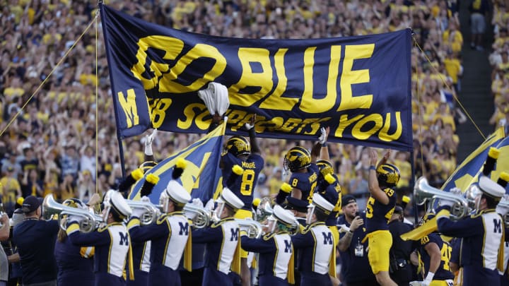 Aug 31, 2024; Ann Arbor, Michigan, USA;  Michigan Wolverines players take the field before a game against the Fresno State Bulldogs at Michigan Stadium. Mandatory Credit: Rick Osentoski-USA TODAY Sports