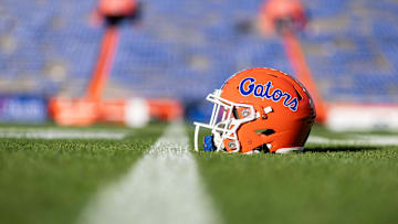 Nov 23, 2024; Gainesville, Florida, USA; A Florida Gators helmet sits on the field before a game against the Mississippi Rebels at Ben Hill Griffin Stadium. Mandatory Credit: Matt Pendleton-Imagn Images