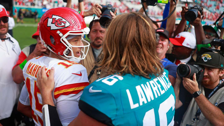 Kansas City Chiefs quarterback Patrick Mahomes (15) says goodbye to Jacksonville Jaguars quarterback Trevor Lawrence (16) after a NFL football game Sunday, Sept. 17, 2023 at EverBank Stadium in Jacksonville, Fla. The Kansas City Chiefs defeated the Jacksonville Jaguars 17-9. [Corey Perrine/Florida Times-Union]