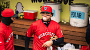 Marcelo Mayer blows a bubble with his gum in the WooSox dugout during a game on April 13, 2025 at Polar Park.