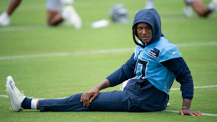 Wide receiver DeAndre Hopkins (10) stretches during the Tennessee Titans mandatory mini-camp at Ascension Saint Thomas Sports Park in Nashville, Tenn., Wednesday, June 5, 2024.